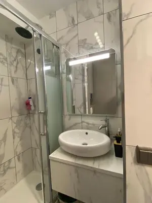 Salle de bains dans l'établissement Appartement T1 Proche Paris à 1min du métro 14
