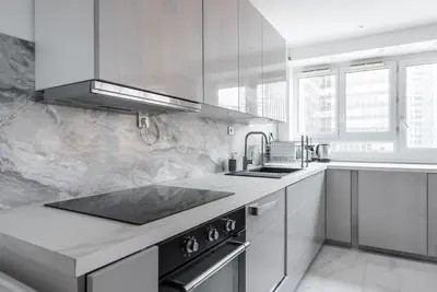 Cuisine ou kitchenette dans l'établissement Appartement luxueux vue Tour Eiffel - Defense