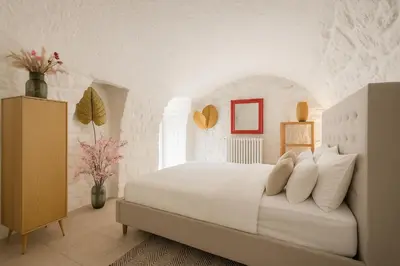 Un ou plusieurs lits dans un hébergement de l'établissement LE LOUVRE - MONTORGEUIL Suites only ws