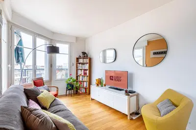 Télévision ou salle de divertissement dans l'établissement GuestReady - Contemporary Apt in the 20th Arr