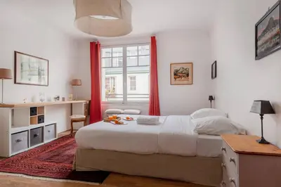 Un ou plusieurs lits dans un hébergement de l'établissement Eiffel Tower Saint Residence