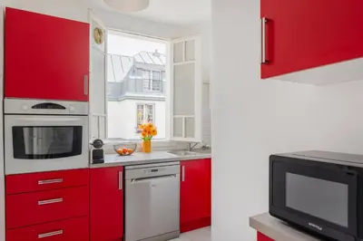 Cuisine ou kitchenette dans l'établissement Eiffel Tower Saint Residence