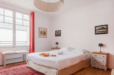 Un ou plusieurs lits dans un hébergement de l'établissement Eiffel Tower Saint Residence