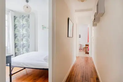 Un ou plusieurs lits dans un hébergement de l'établissement Eiffel Tower Saint Residence
