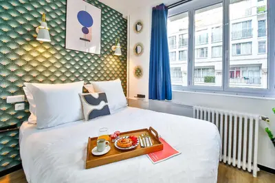 Un ou plusieurs lits dans un hébergement de l'établissement WS Hôtel de Ville - Beaubourg
