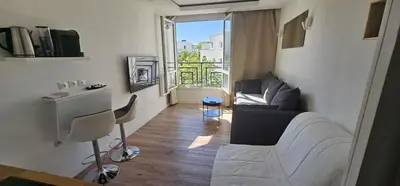 Télévision ou salle de divertissement dans l'établissement Studio T1 Cosy proche Paris et Stade de France
