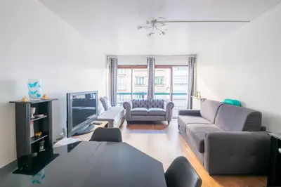 Coin salon dans l'établissement Appartement Glaciere