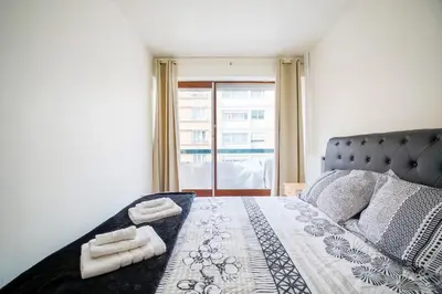 Un ou plusieurs lits dans un hébergement de l'établissement Appartement Glaciere
