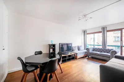 Télévision ou salle de divertissement dans l'établissement Appartement Glaciere