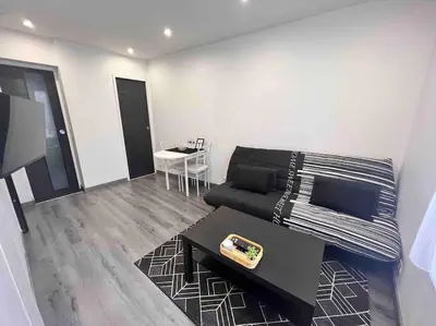 Coin salon dans l'établissement Beau T2 à Arcueil proche RER B.