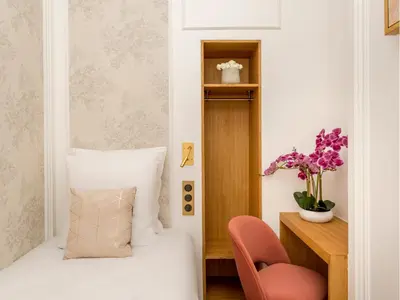 Un ou plusieurs lits dans un hébergement de l'établissement Merveil - Luxury Suite -ChampsElysees-Florentin II