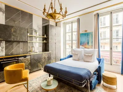 Un ou plusieurs lits dans un hébergement de l'établissement Merveil - Luxury Suite -ChampsElysees-Florentin II