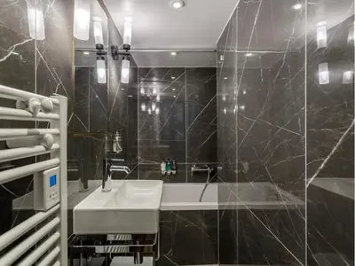 Salle de bains dans l'établissement Merveil - Luxury Suite -ChampsElysees-Florentin II