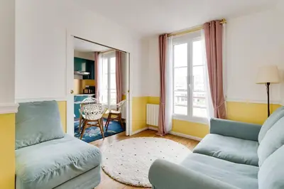 Coin salon dans l'établissement Duplex Moderne Cosy - Proche Porte d'Italie - Parking
