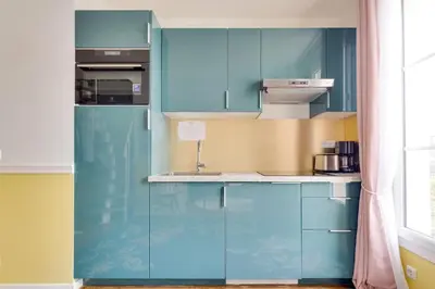 Cuisine ou kitchenette dans l'établissement Duplex Moderne Cosy - Proche Porte d'Italie - Parking
