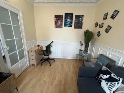 Coin salon dans l'établissement Nice 2 Rooms Full Appartement in Paris