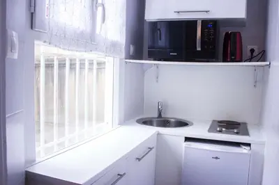 Cuisine ou kitchenette dans l'établissement Nice studio - 2P - near Paris