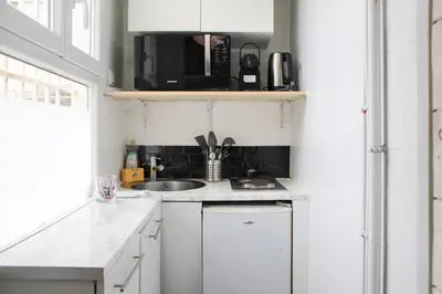 Cuisine ou kitchenette dans l'établissement Nice studio - 2P - near Paris