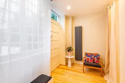 Coin salon dans l'établissement GuestReady -Beautiful 2-Room in the Heart of Paris