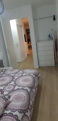 Un ou plusieurs lits dans un hébergement de l'établissement La Terrasse - big apartment & terrace 80m2 - metro 17 min from Paris