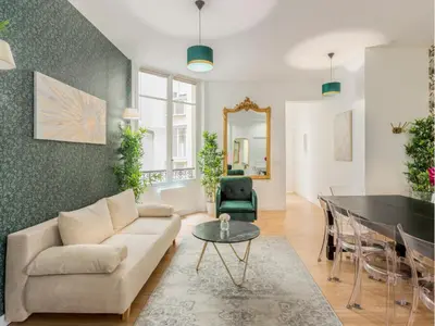 Coin salon dans l'établissement Merveil - Family Suite - Marais - Martin III
