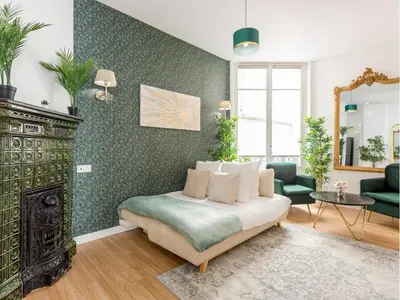 Coin salon dans l'établissement Merveil - Family Suite - Marais - Martin III