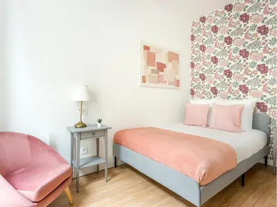 Un ou plusieurs lits dans un hébergement de l'établissement Merveil - Family Suite - Marais - Martin IV