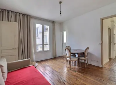 Coin salon dans l'établissement Sweet and cosy apartment near the Eiffel Tower, Roland Garros & PSG Stadium