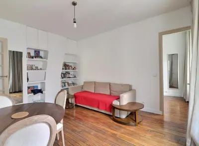 Coin salon dans l'établissement Sweet and cosy apartment near the Eiffel Tower, Roland Garros & PSG Stadium