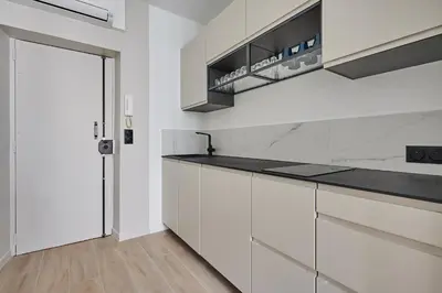 Cuisine ou kitchenette dans l'établissement Residence Center of Paris by Studio prestige