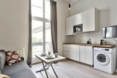 Cuisine ou kitchenette dans l'établissement Studio Vivienne - Welkeys