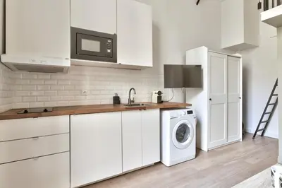 Cuisine ou kitchenette dans l'établissement Studio Vivienne - Welkeys