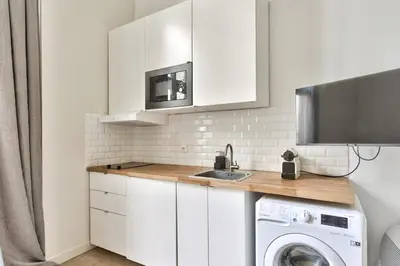 Cuisine ou kitchenette dans l'établissement Studio Vivienne - Welkeys