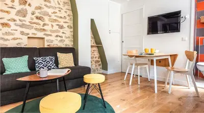 Coin salon dans l'établissement The 199 - Charming apartment in the heart of Paris