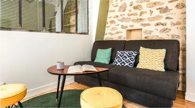 Coin salon dans l'établissement The 199 - Charming apartment in the heart of Paris