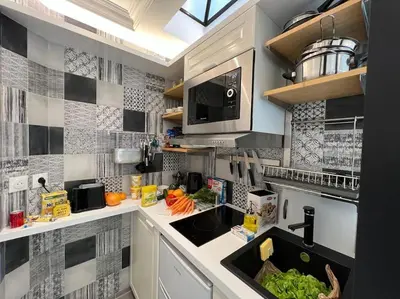 Cuisine ou kitchenette dans l'établissement Studio tout équipé à Nation Paris XI-Tout confort