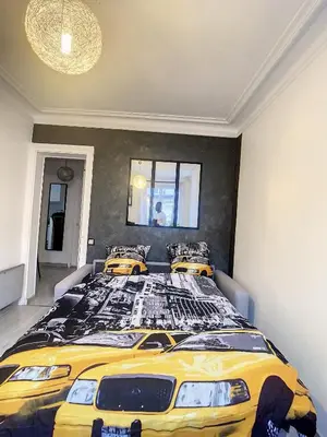 Un ou plusieurs lits dans un hébergement de l'établissement Appartement Rénové & son Balcon Parisien