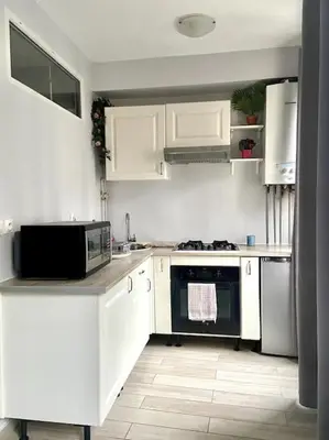Cuisine ou kitchenette dans l'établissement Apartment in the heart of Chinatown, Paris