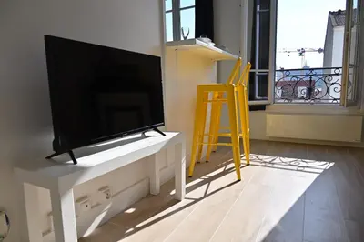 Télévision ou salle de divertissement dans l'établissement Cosy Studio