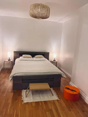 Un ou plusieurs lits dans un hébergement de l'établissement Chic Apartment on the famous shopping Rue du Faubourg Saint-Honoré street