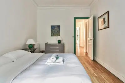 Un ou plusieurs lits dans un hébergement de l'établissement Appartement Caulain - Welkeys