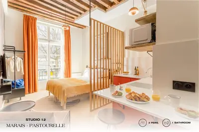 Un ou plusieurs lits dans un hébergement de l'établissement Beauquartier - Marais Pastourelle
