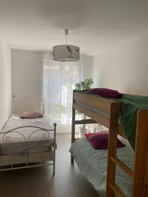 Un ou plusieurs lits dans un hébergement de l'établissement Bel appartement de 65 m2 - bail mobilité