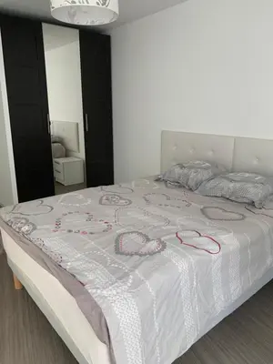 Un ou plusieurs lits dans un hébergement de l'établissement Bel appartement de 65 m2 - bail mobilité