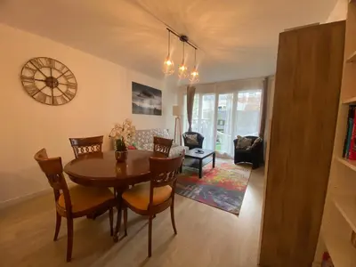 Coin salon dans l'établissement Bel appartement de 65 m2 - bail mobilité