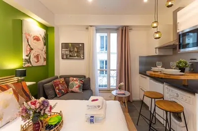 Coin salon dans l'établissement Cosy Studio - 2P- Beauregard - 3