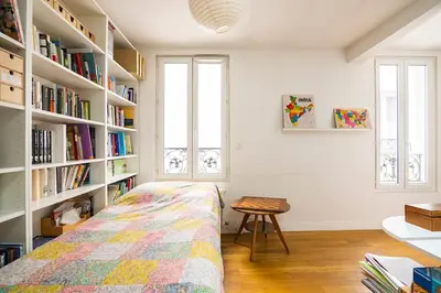 Un ou plusieurs lits dans un hébergement de l'établissement Country home in Paris