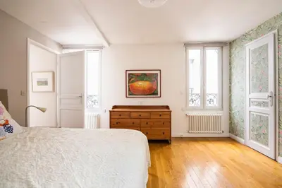 Un ou plusieurs lits dans un hébergement de l'établissement Country home in Paris