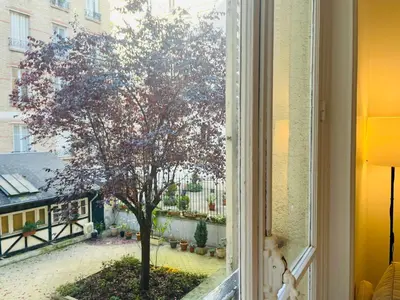 Jardin de l'établissement Cozy historic appartement near Exelmans in 16th District Paris