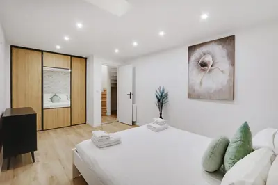 Un ou plusieurs lits dans un hébergement de l'établissement Pick A Flat's Apartment in La Chapelle - Impasse du Curé